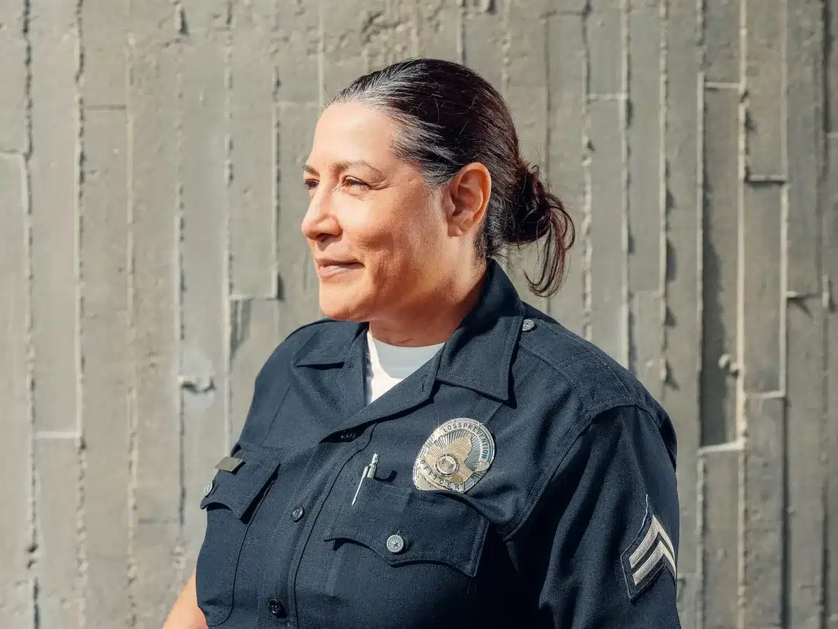 Women in professional uniforms working in a male-dominated police environment