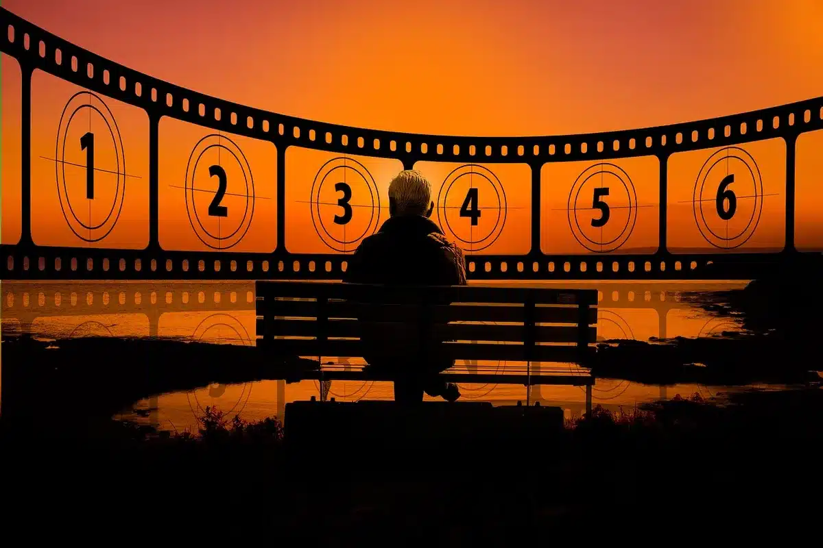Clapperboard and script pages on a table symbolizing failed film projects