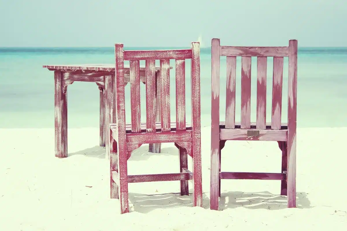 Empty writers' room with scattered notes and empty chairs