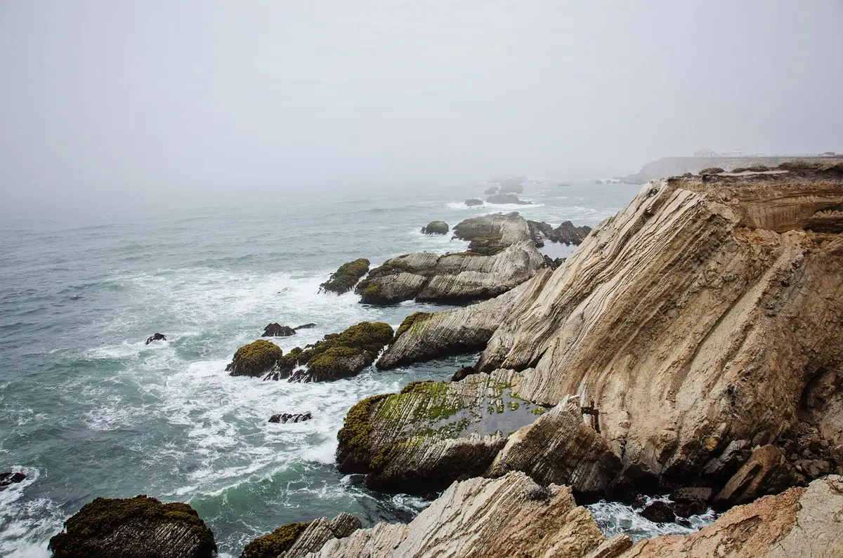 Rugged Newfoundland fishing village with small houses and rocky coast