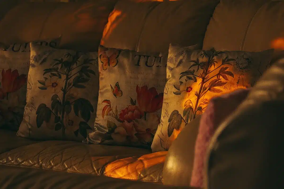 Three women in a living room setting representing the family dynamic
